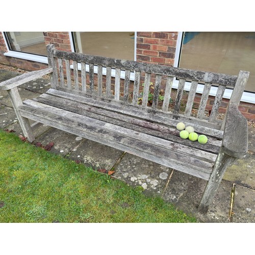 1308 - 2 teak garden benches, largest 86cm high, 195cm wide, 54cm deep. (2) This item is not held by PF Win... 