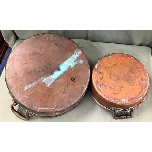 1313 - A large antique jam pot, 43cm diameter and a smaller copper jam pot, 32cm diameter