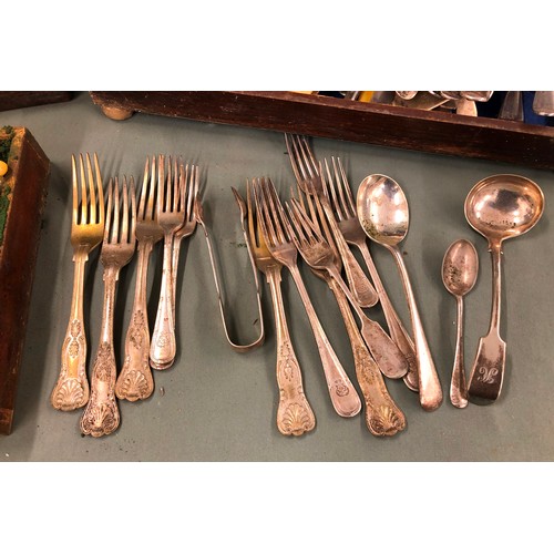 1317 - A large quantity of various odd flatware including Kings pattern, in 2 wood boxes.