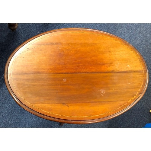 1321 - An oval topped occasional table, top 67 x 47cm, 73cm high (some shading and marks to top)