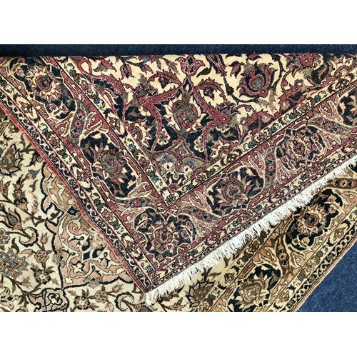 1325 - A Persian rug with centre medallion (faded) 207 long, 136cm wide