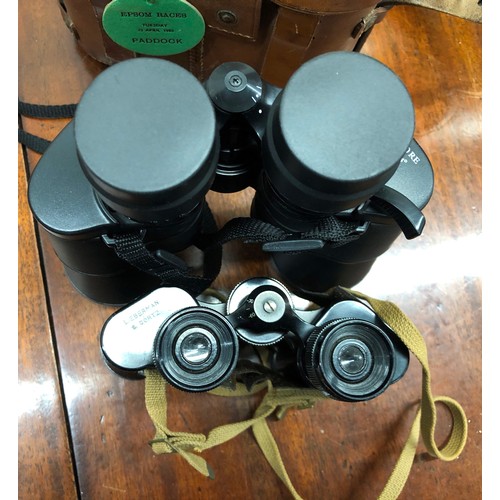 1329 - A pair of Lieberman & Gortz 8 x 32 binoculars (worn) in leather case and another pair of binoculars ... 