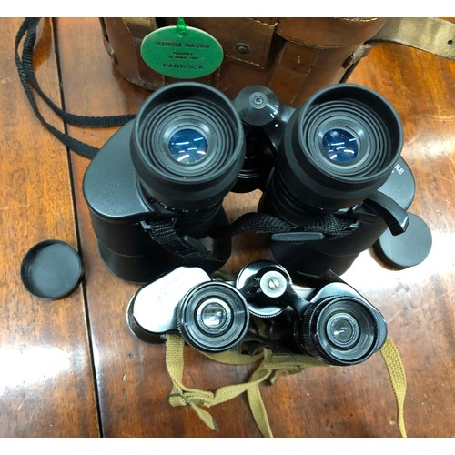 1329 - A pair of Lieberman & Gortz 8 x 32 binoculars (worn) in leather case and another pair of binoculars ... 