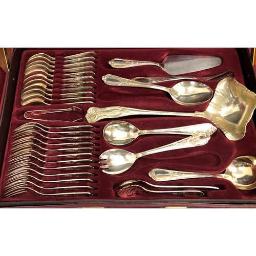 1334 - A briefcase shaped cased canteen of Bestecke Solingen silver-plated 