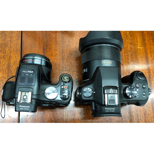 1345 - A Lumix Panasonic DMC-FZ1000 with a Leica 1:2.8 - 4.0/9.1-146 lens, a Lumix Panasonic DMC- FZ150 cam... 