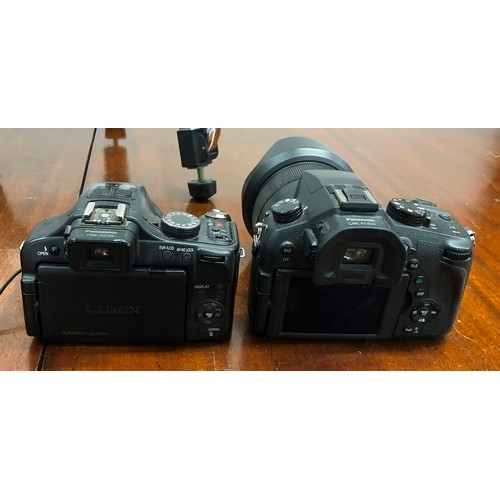 1345 - A Lumix Panasonic DMC-FZ1000 with a Leica 1:2.8 - 4.0/9.1-146 lens, a Lumix Panasonic DMC- FZ150 cam... 