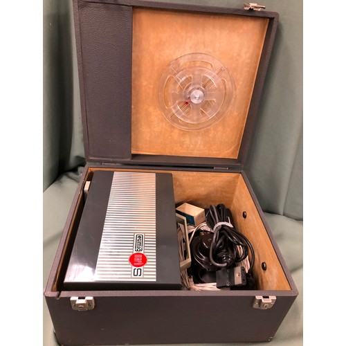 1353 - An Austrian Eumig Mark S projector in hard case and with various accessories.