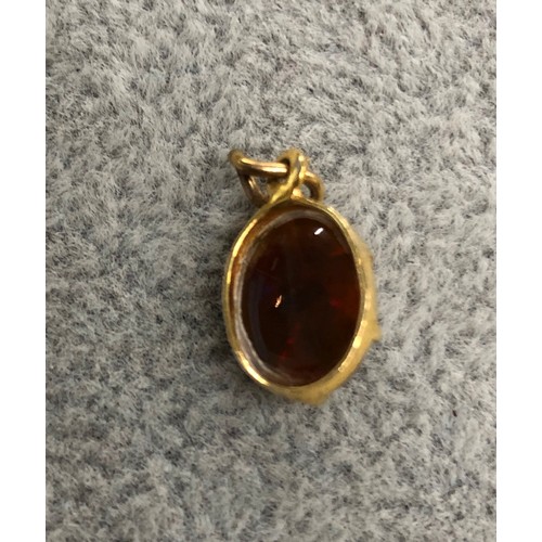 1286 - A fire opal pendant, 1.3cm long