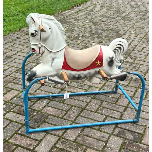 1138 - A vintage rocking horse on metal stand, 85cm long, 77cm high, 49cm wide.