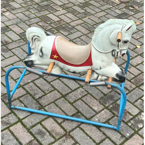 1138 - A vintage rocking horse on metal stand, 85cm long, 77cm high, 49cm wide.