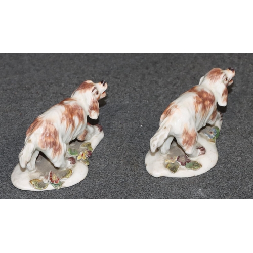 93 - A pair of 18th/19th Century Derby figures of dogs with encrusted floral decoration, 8cm wide, 5cm hi... 