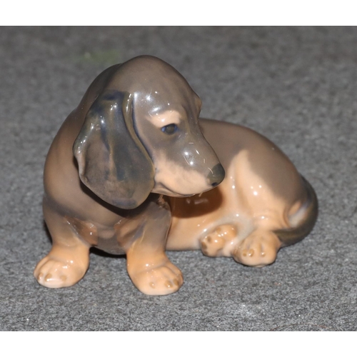 97 - A Royal Copenhagen figure of a Dachshund, 3140, 7.5cm high