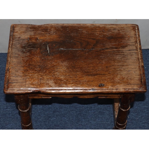 985 - An oak rectangular shaped joint stool with thumb pattern frieze with open barley twist legs and stre... 