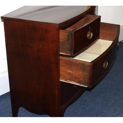 988 - A 19th Century small mahogany bow fronted chest of drawers, 2 short above 2 long graduated drawers w... 