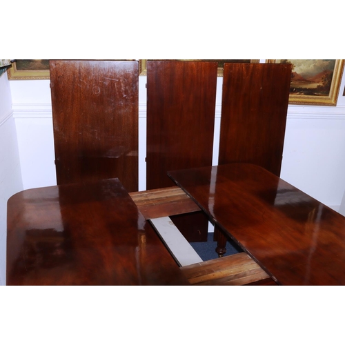 989 - A Large 19th century mahogany key wind dining table with 3 extra leaves (leaves later) 308cm x 146cm... 