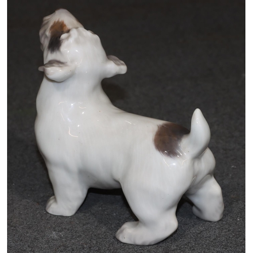 99 - A Copenhagen figure of a Terrier, 13cm high, 14cm long