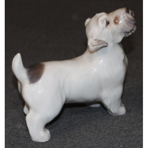 99 - A Copenhagen figure of a Terrier, 13cm high, 14cm long