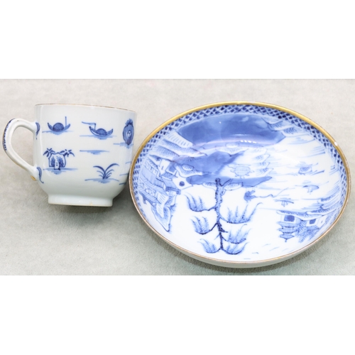 152 - An 18th Century Chinese blue and white cup and saucer with figure, river landscape and building deco... 