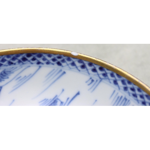 152 - An 18th Century Chinese blue and white cup and saucer with figure, river landscape and building deco... 