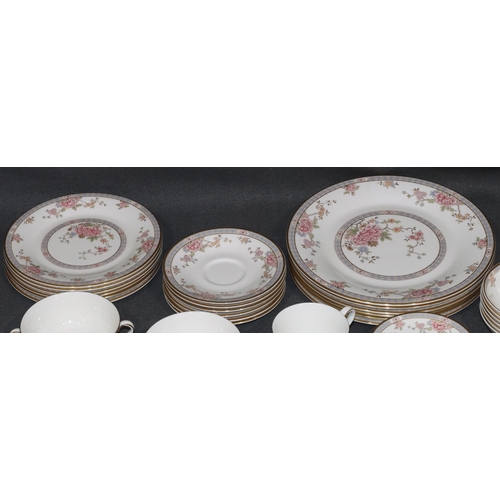 153 - A Royal Doulton Canton (H5052) 6-place setting pattern dinner service, comprising of sauce boat and ... 