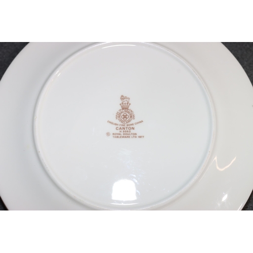 153 - A Royal Doulton Canton (H5052) 6-place setting pattern dinner service, comprising of sauce boat and ... 