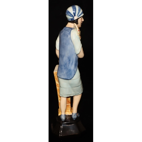 21 - A Kevin Francis Ceramics Clarice Cliff Art Deco figure, limited edition number 123 (with certificate... 