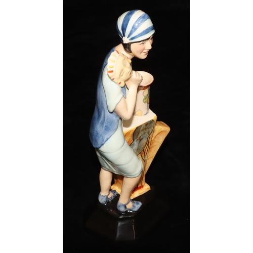 21 - A Kevin Francis Ceramics Clarice Cliff Art Deco figure, limited edition number 123 (with certificate... 