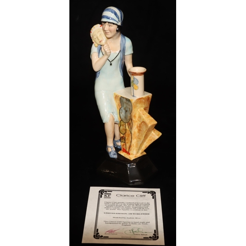 21 - A Kevin Francis Ceramics Clarice Cliff Art Deco figure, limited edition number 123 (with certificate... 