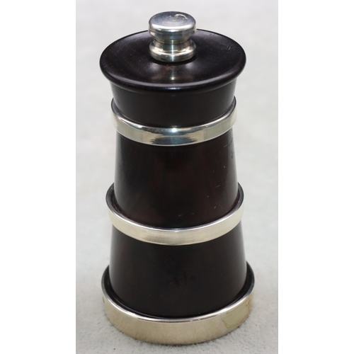 245 - A rosewood and silver mounted milk churn shaped pepper grinder, 9.5cm high