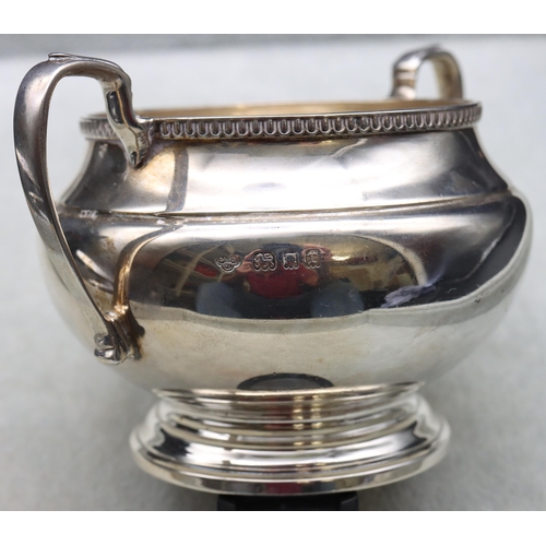 251 - A George V silver round bulbous shaped 2-handled sugar bowl, London 1932, maker Goldsmiths & Silvers... 