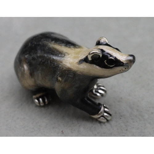 278 - A Saturno 925 silver and enamelled figure of a Badger, 5cm long, 1.1oz