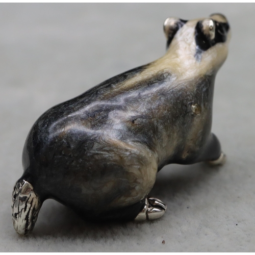 278 - A Saturno 925 silver and enamelled figure of a Badger, 5cm long, 1.1oz