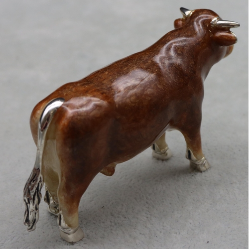 283 - A Saturno 925 silver and enamelled model of a Bull, 9.5cm long, 5cm high, 3.8oz