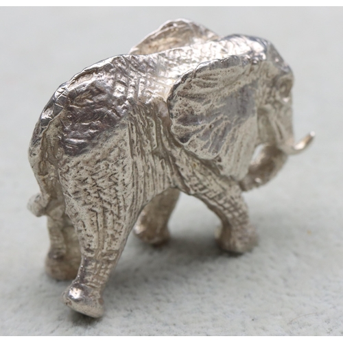 295 - A small solid silver figure of an elephant, 4.5cm wide, 1.6oz