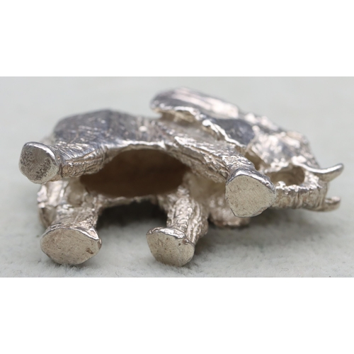 295 - A small solid silver figure of an elephant, 4.5cm wide, 1.6oz