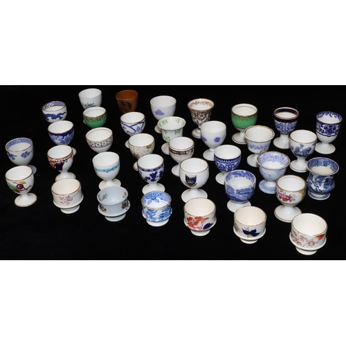 31 - 35 various china and other egg cups