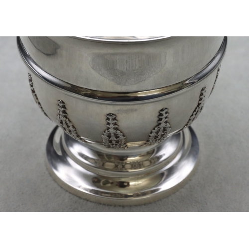 313 - An Edward VII silver round trumpet shaped bowl with swing overhead handle, part raised floral and sc... 