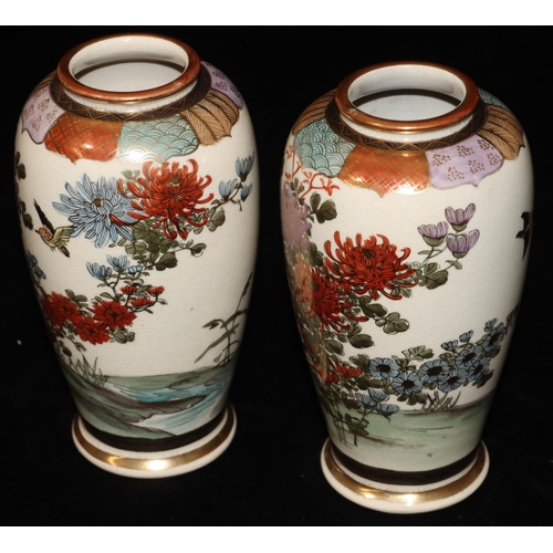 4 - A pair of Meiji round bulbous thin necked vases on cream ground with multi-coloured bird, floral, ri... 