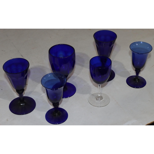 40 - A pair of 18th/19th Century Bristol blue round trumpet shaped glasses on round bases, 12cm high, ano... 