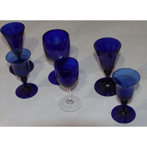 40 - A pair of 18th/19th Century Bristol blue round trumpet shaped glasses on round bases, 12cm high, ano... 