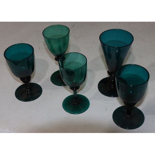 46 - 2 Georgian Bristol green glasses with raised dimple and triangular decoration on round bases, larges... 