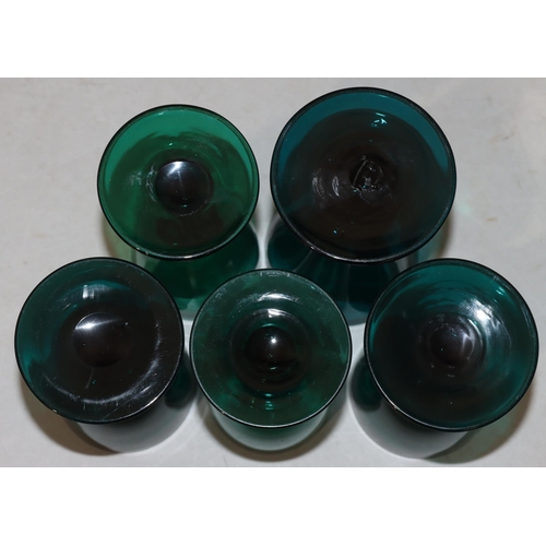 46 - 2 Georgian Bristol green glasses with raised dimple and triangular decoration on round bases, larges... 