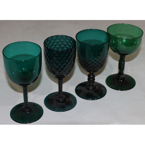 47 - A 4 Georgian Bristol green glass bulbous shaped drinking glasses on round bases largest 13.7cm high