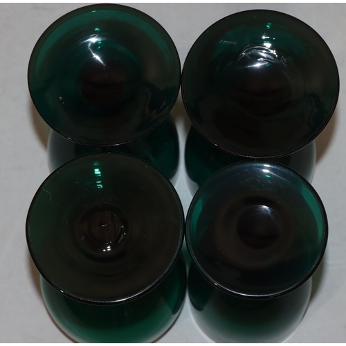 49 - A pair of Georgian Bristol green round bulbous shaped glasses with chamfer stems on round bases, 12.... 