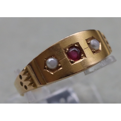 513 - A 22ct gold signet ring mounted with centre ruby flanked by 2 half pearls, Size L/M, 1.8 grams gross