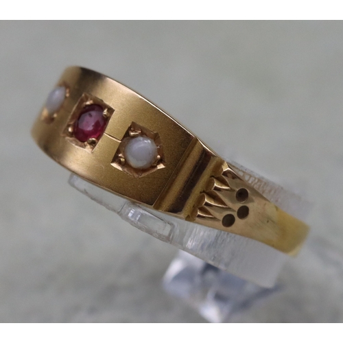 513 - A 22ct gold signet ring mounted with centre ruby flanked by 2 half pearls, Size L/M, 1.8 grams gross