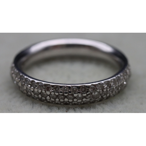 514 - An 18ct white gold ladies' diamond full eternity ring with 3 rows of small diamonds, maker's mark TH... 