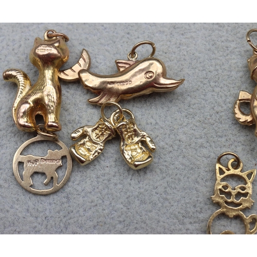 525 - 7 various 9ct gold charms, 15 grams gross