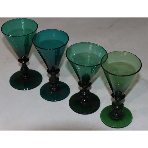 54 - 4 odd Georgian Bristol green round trumpet shaped glasses with knob stems on round bases (4)