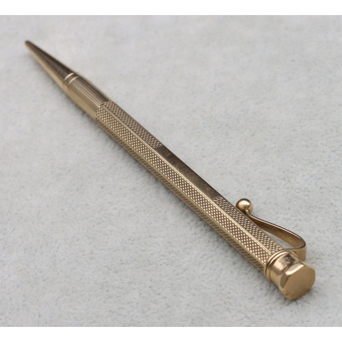 542 - A 9ct gold Baker's Perm-Point hexagonal propelling pencil with engine turned decoration, overall wei... 